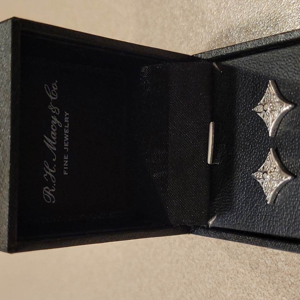 Diamond Star Stud Earrings (1/10 ct. t.w.) in Sterling Silver - Picture 7 of 9